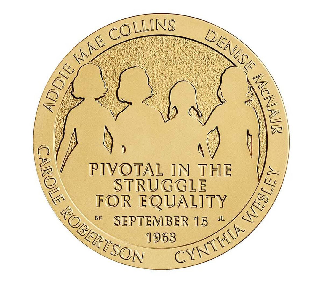 Bronze medal honoring 16th Street Baptist Church bombing victims with silhouettes and names of Addie Mae Collins, Denise McNair, Carole Robertson, Cynthia Wesley