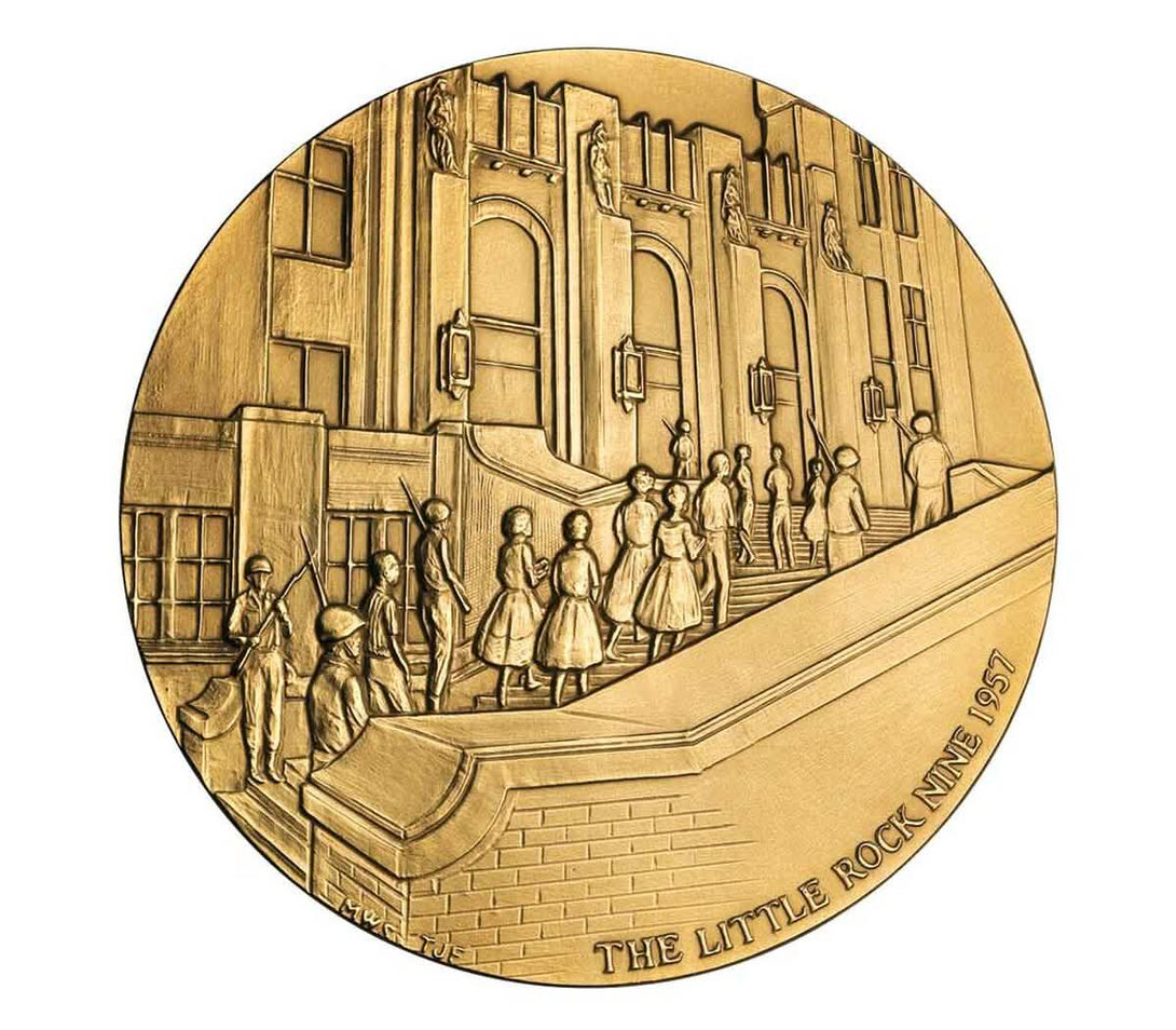 Bronze medal depicting The Little Rock Nine entering Central High School in 1957, escorted by soldiers during school desegregation in Arkansas.