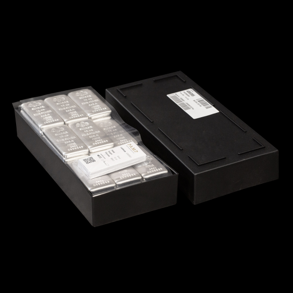 Open black box containing ten PAMP Suisse 10 oz silver bars, neatly arranged with assay certificates on top, alongside the box lid with a white label.