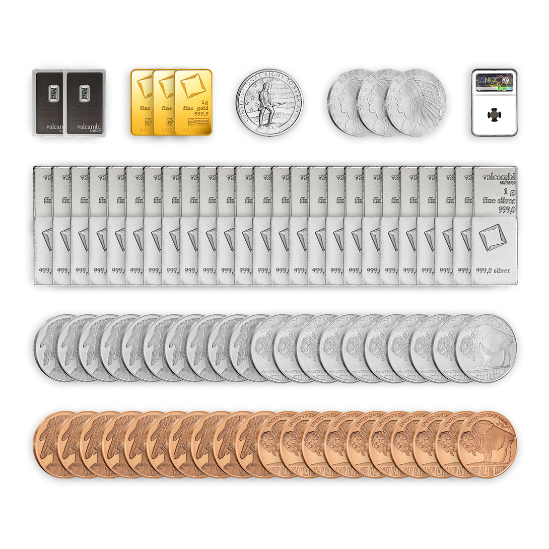 Maverick Box by United Patriot Coins featuring silver bars, Buffalo silver and copper rounds, Valcambi gold bars, and a certified ancient coin.