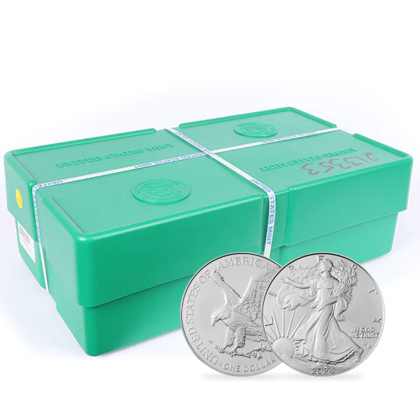 Green U.S. Mint monster box sealed with straps, shown with two 2024 American Silver Eagle coins in front.